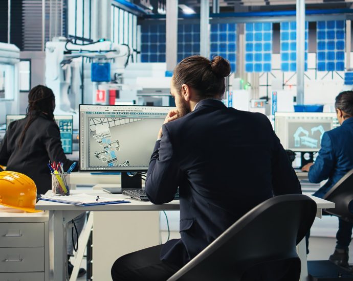 Modern smart factory using AI monitoring systems and hyper-automation to enhance productivity and reduce technician workload